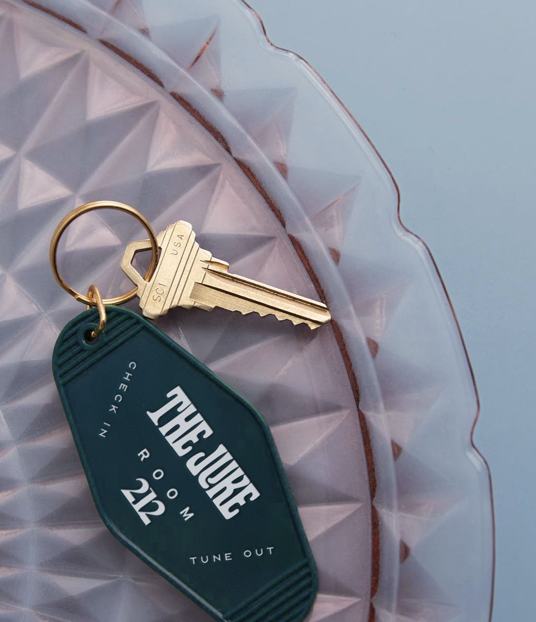 The Juke Hotel — room key on textured tray